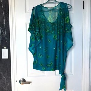 Ricki’s Revolution sheer butterfly top